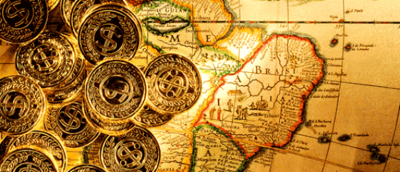 Gold colored map and coins